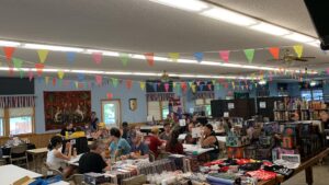 Participants playing tabletop games in the dining and gaming hall
